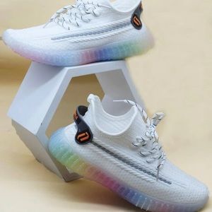 White knit sneaker with rainbow soles